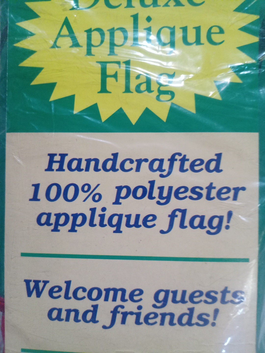 Pink yellow, red,and orange Tulip with green leaves in a bow(Welcome Flag) no po